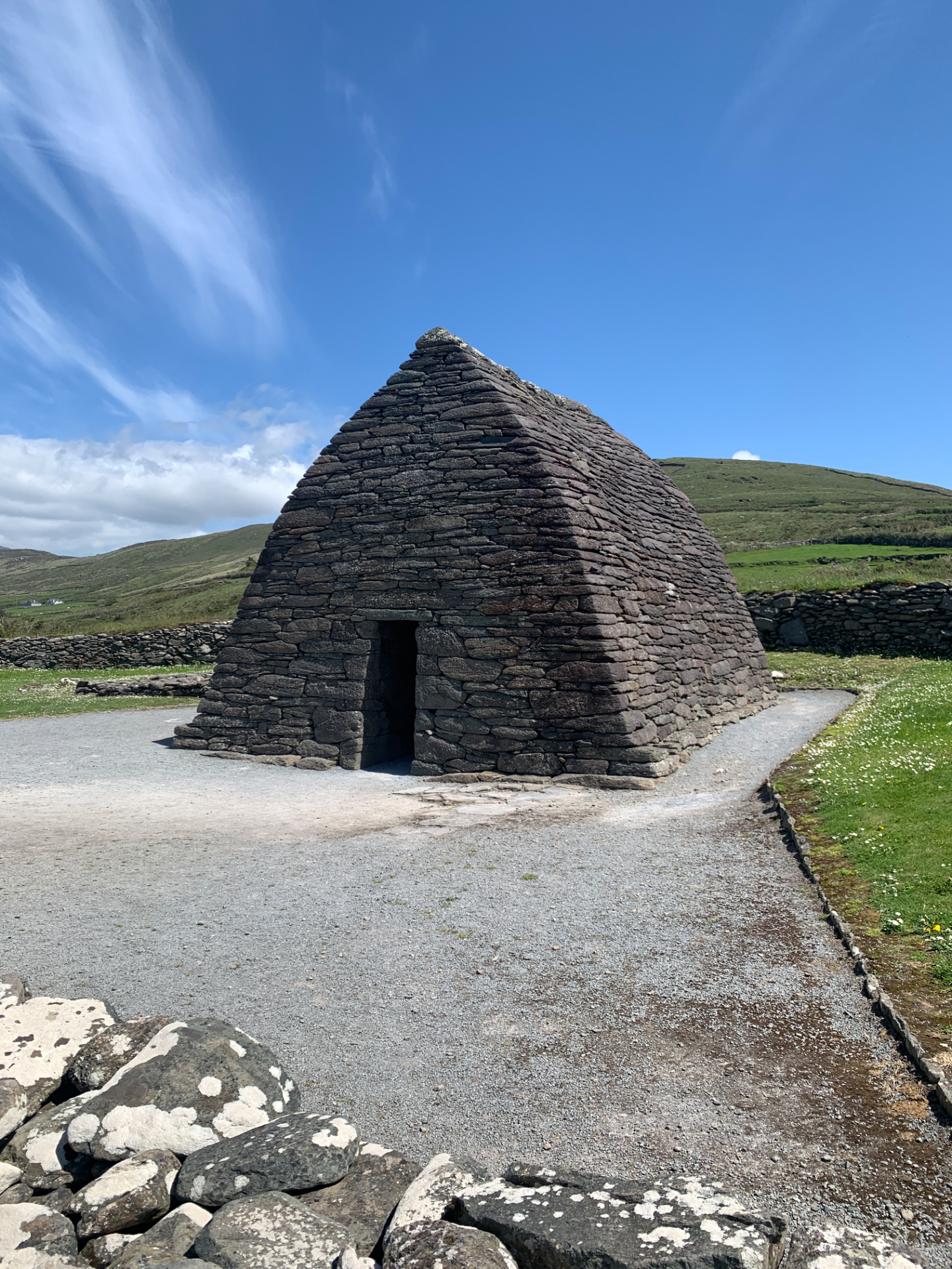 The Gallarus Oratory on the Dingle Peninsula, ancient customs on an ancient site, connecting us from modern times into a landscape of faith and contemplation.