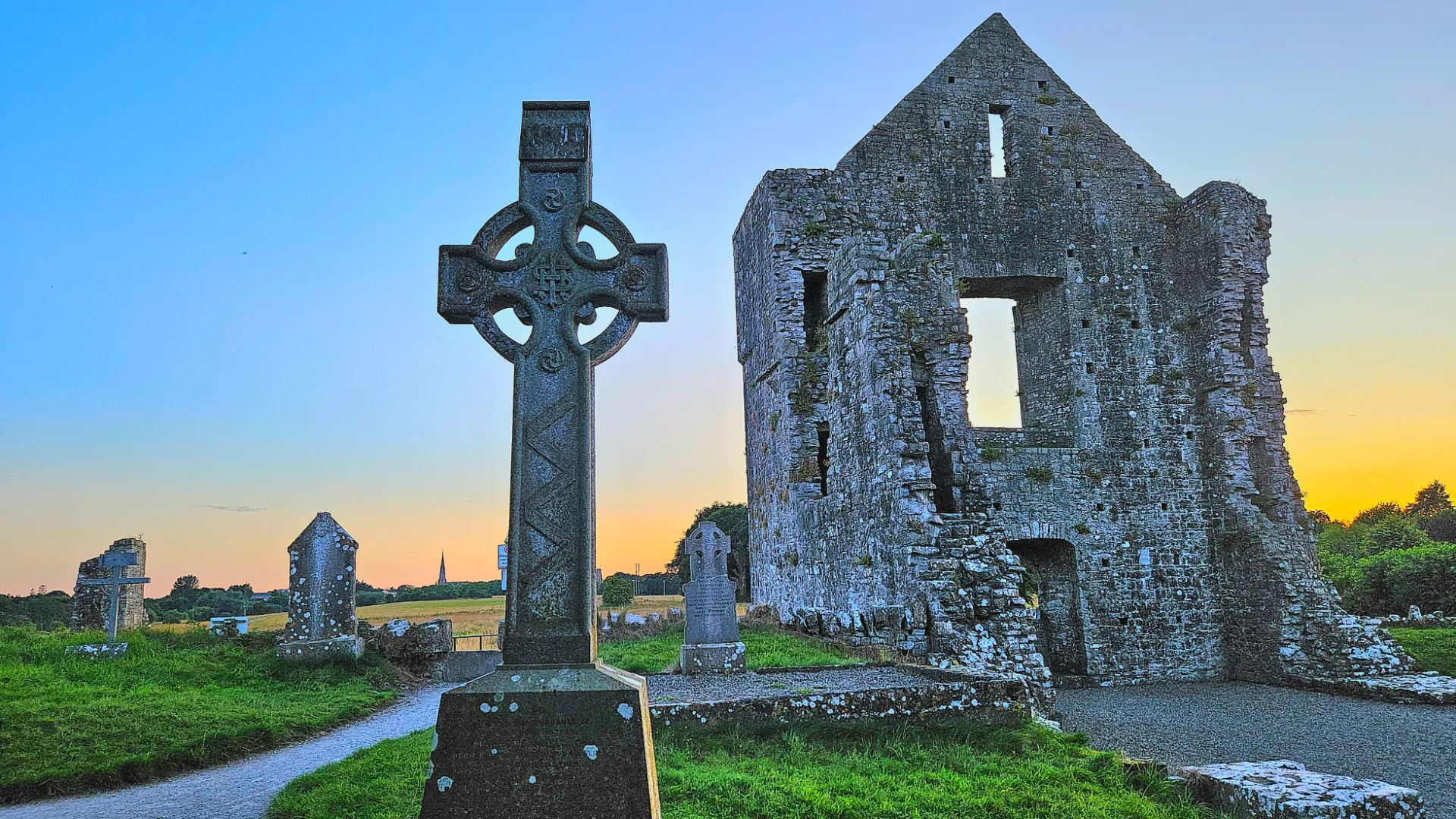 Celtic Cross and ancient church.